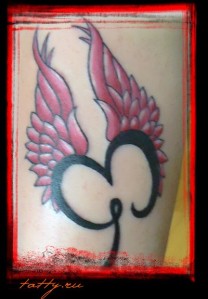 hand tattoo wings style for women